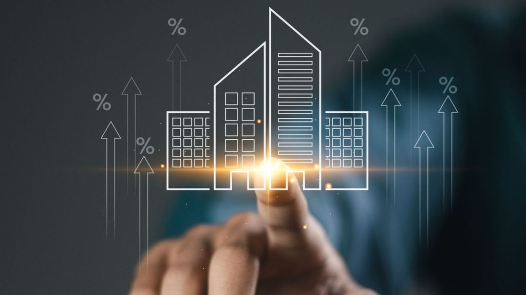 Hand Touching a Glowing Holographic City Skyline Outline, with Arrows and % Symbols Suggesting Growth and Data-driven Urban Planning. - Capitanes Regios